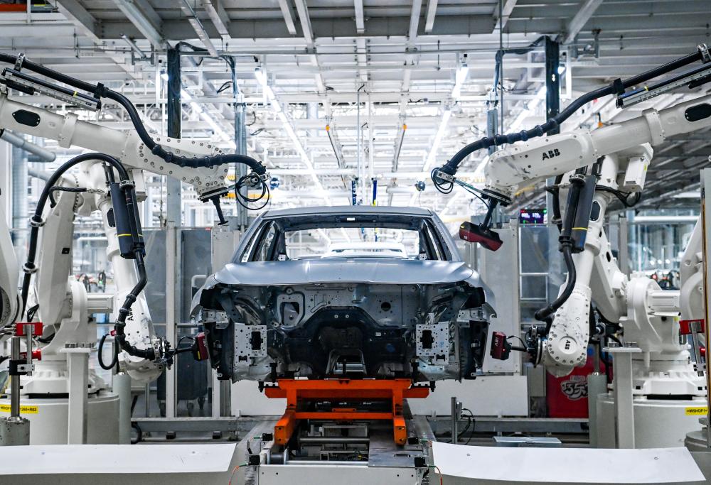 does tesla source parts from china